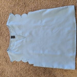 Blue sleeveless blouse
